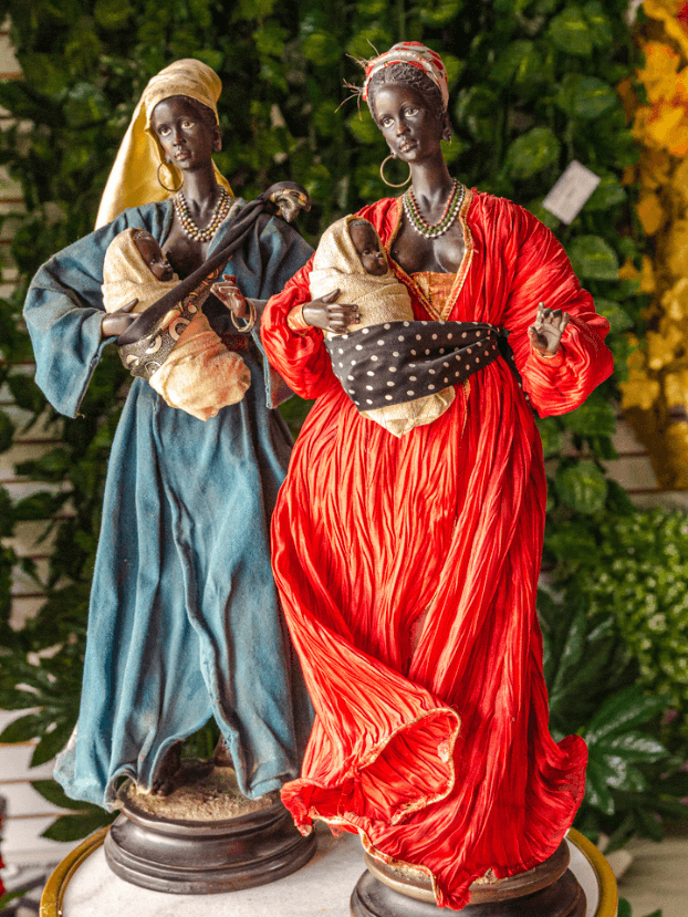 Africana sosteniendo un bebe - Decora tu Hogar Envios a Bogotá y toda Colombia | Dkora Colombia