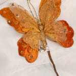Mariposa pequeña con aplieques en gemas – Rojo - Decora tu Navidad Envios a Bogotá y toda Colombia | Dkora Colombia