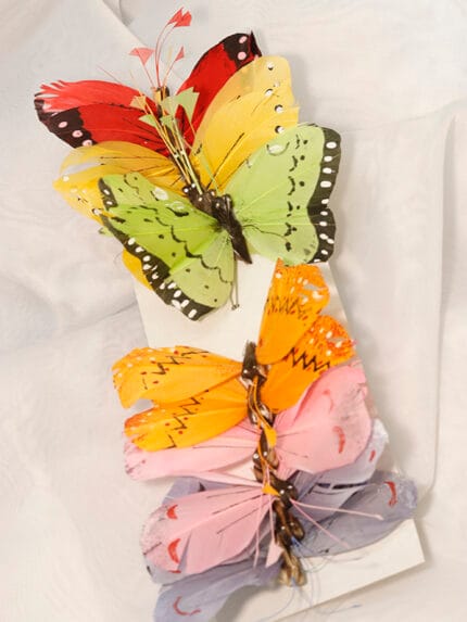 Mariposa en plumas por 12 – Surtido - Decora tu Navidad Envios a Bogotá y toda Colombia | Dkora Colombia