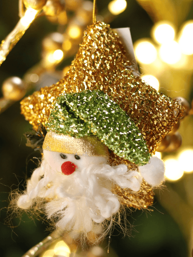 Estrella dorada con muñeco noel en frente, tela esponjilla - Decora tu Navidad Envios a Bogotá y toda Colombia | Dkora Colombia