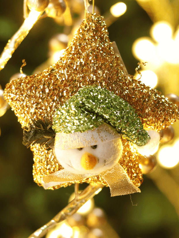 Estrella dorada con muñeco nieve en frente, tela esponjilla - Decora tu Navidad Envios a Bogotá y toda Colombia | Dkora Colombia