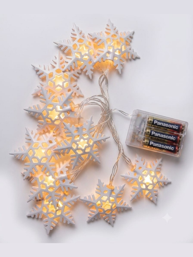 Guirnalda de 1,70 m con 10 copos de nieve LED en luz cálida. Ideal para crear ambientes navideños acogedores y especiales. - Decora tu Navidad Envios a Bogotá y toda Colombia | Dkora Colombia